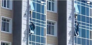 Homem arrisca a vida e salva uma criança pendurada na janela no 8º andar de um prédio de apartamentos