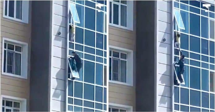 Homem arrisca a vida e salva uma criança pendurada na janela no 8º andar de um prédio de apartamentos