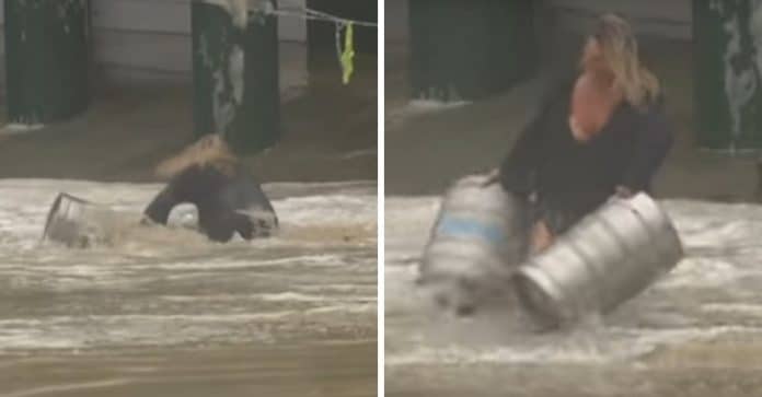 Mulher arrisca a vida em tempestade para salvar barris de cerveja