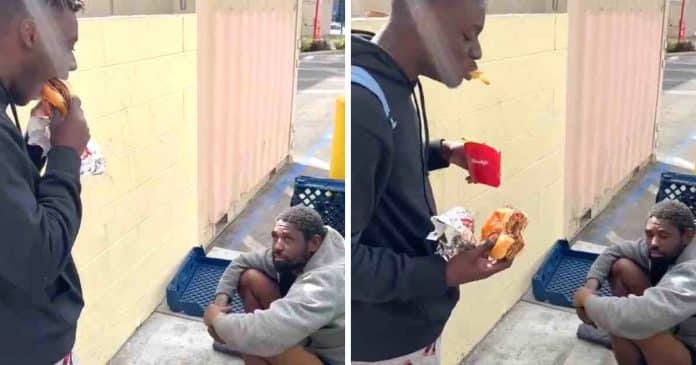 Youtuber compra comida para morador de rua mas depois comeu tudo na frente dele: “Que desprezível”