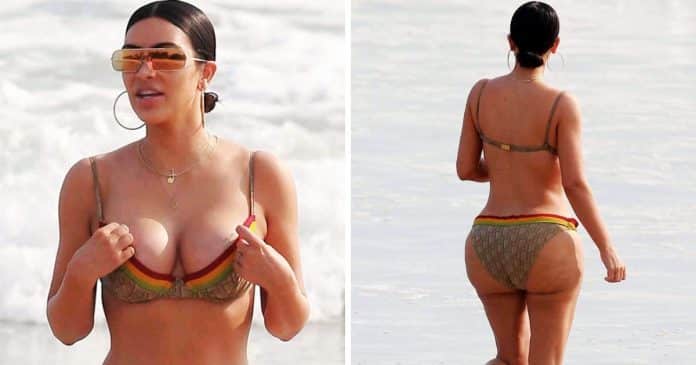 Kim Kardashian choca fãs ao ser flagrada na praia exibindo seu corpo real diferente das fotos nas redes sociais
